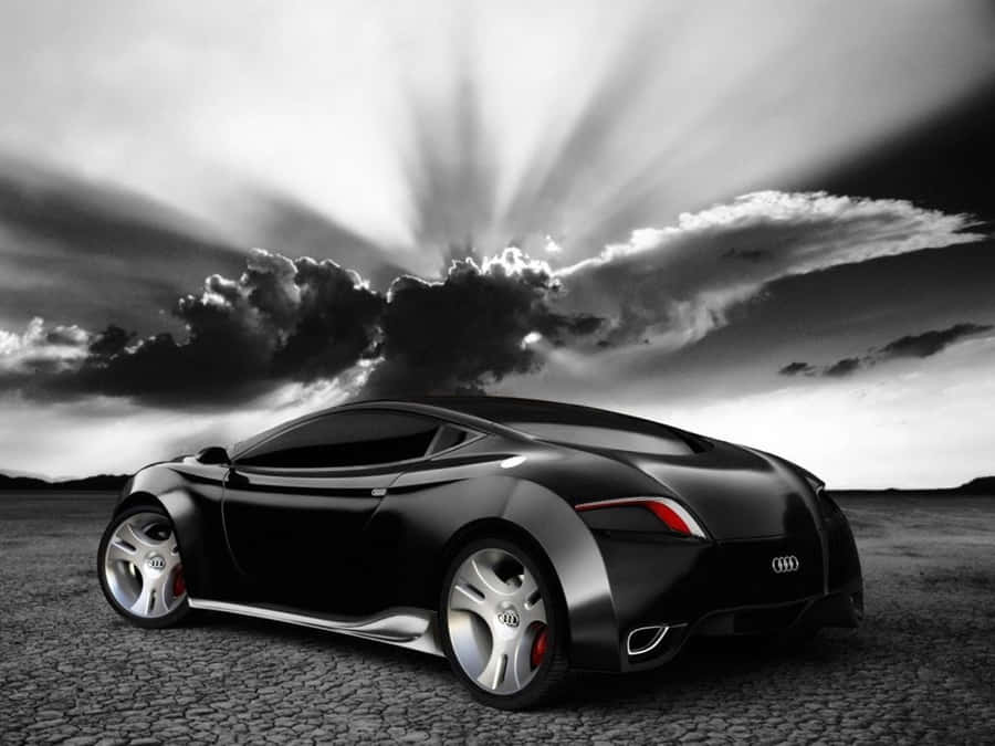 A Black And White Image Of A Sports Car Wallpaper