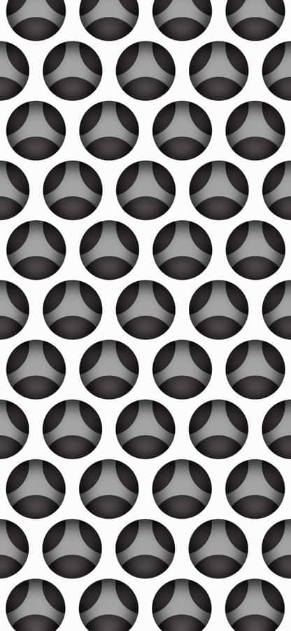 A Black And White Pattern With A Lot Of Circles Wallpaper