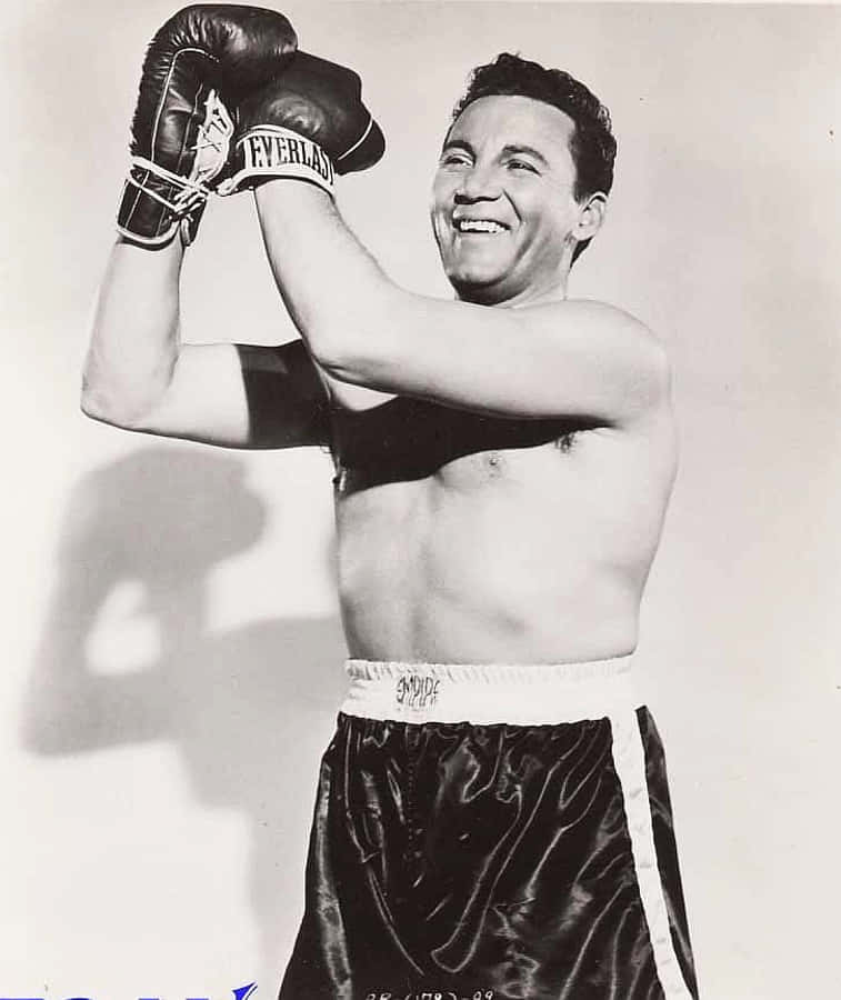 A Black And White Photo Of A Man With Boxing Gloves Wallpaper