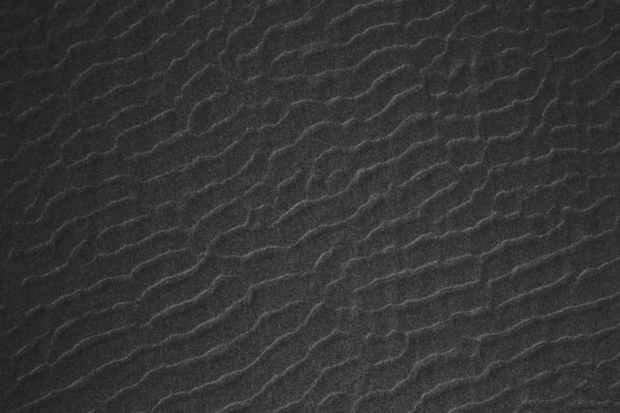 A Black And White Photo Of A Sand Texture Wallpaper