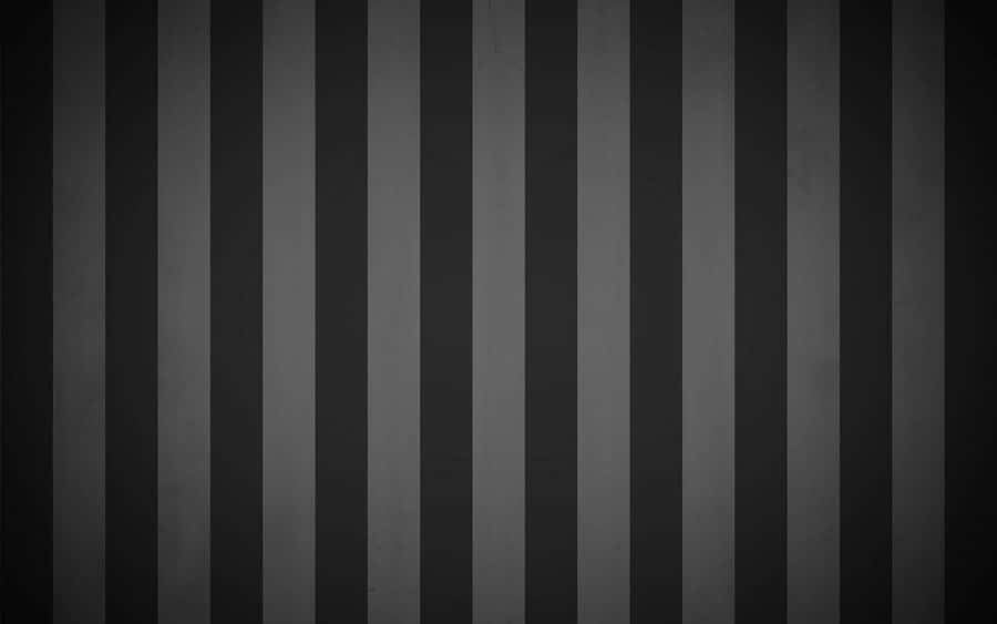 A Black And White Striped Wallpaper Wallpaper