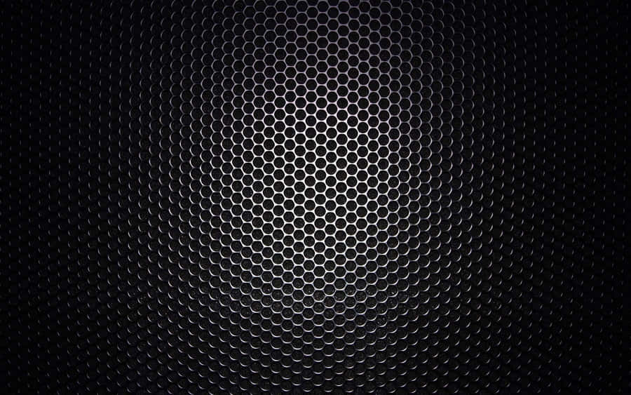 A Black Background With A Metal Grille Wallpaper