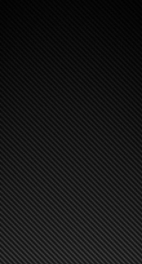 A Black Carbon Fiber Background With A Black Background Wallpaper