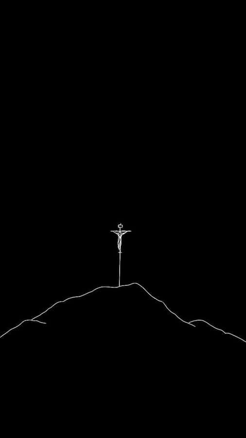 A Black Cross Stands Tall Against The Backdrop Of A Clear Night Sky. Wallpaper
