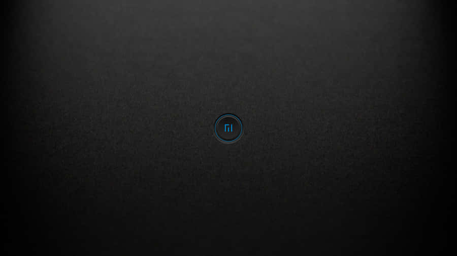 A Black Phone With A Blue Button On It Wallpaper