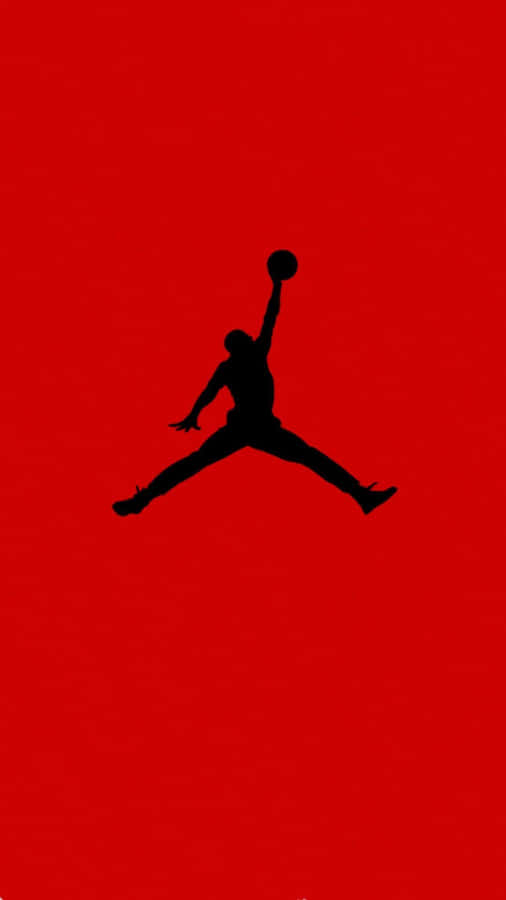 A Black Silhouette Of A Jordan Jumper On A Red Background Wallpaper
