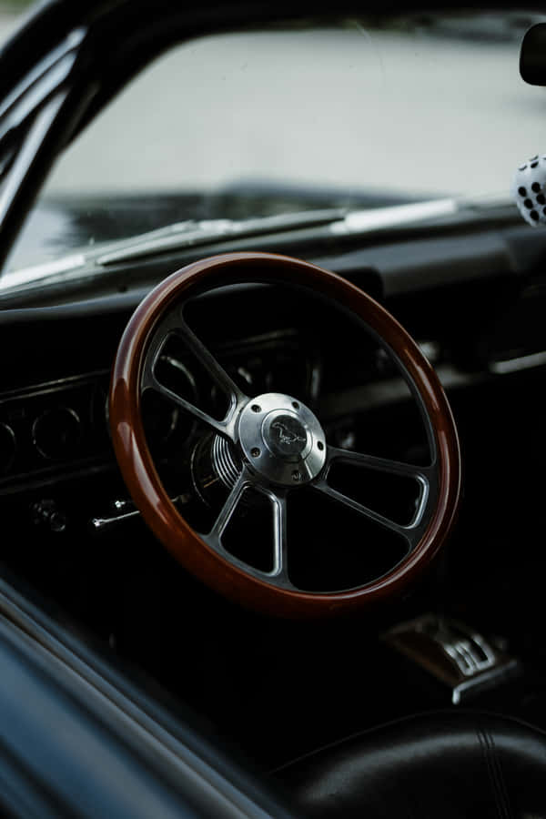 A Black Steering Wheel Wallpaper