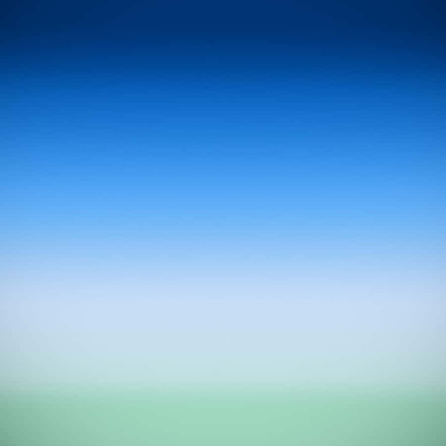 A Blue And Green Background With A Grassy Field Wallpaper