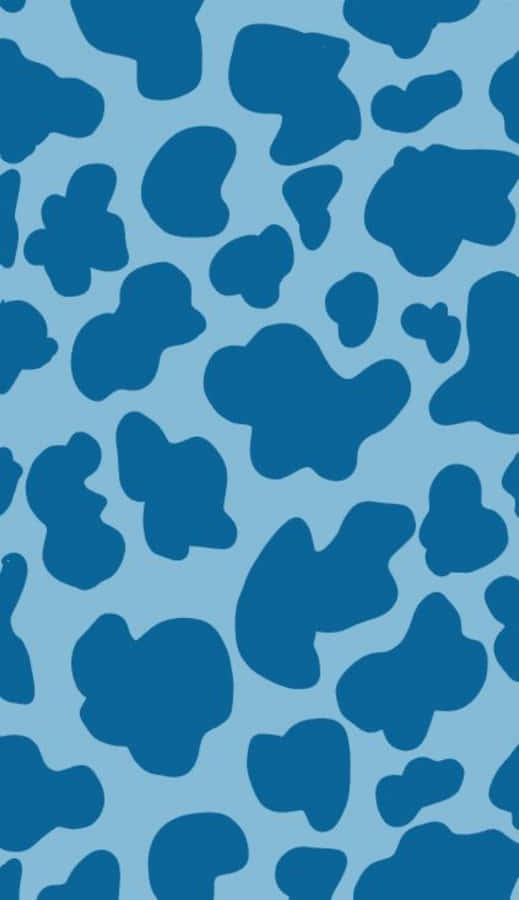 A Blue And White Cow Print Pattern Wallpaper