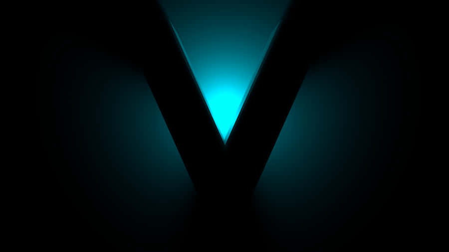 A Blue Light Is Shining On The Letter V Wallpaper