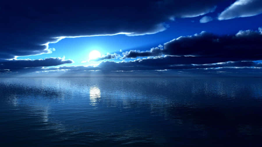A Blue Sky With Clouds And Water Wallpaper