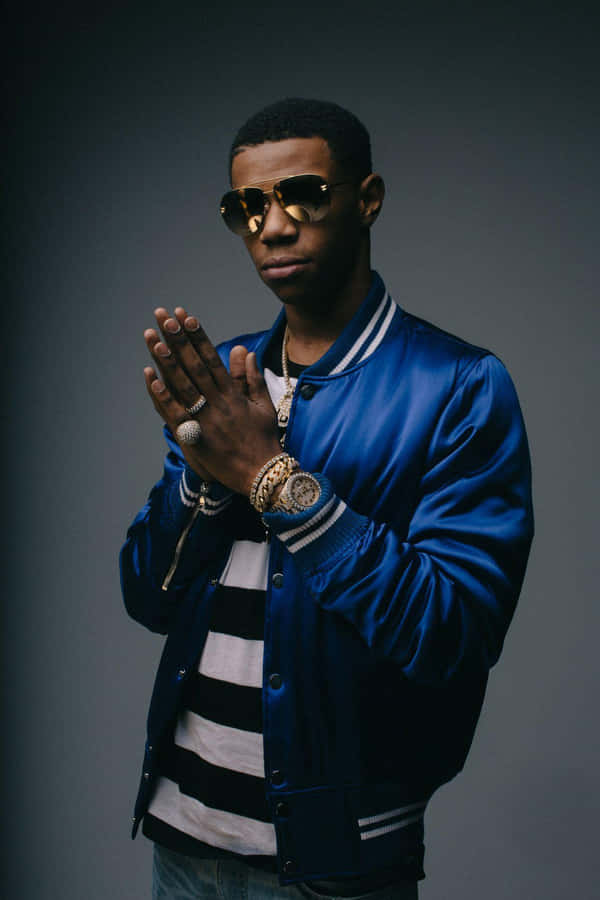 “a Boogie Wit Da Hoodie Performing On Stage” Wallpaper