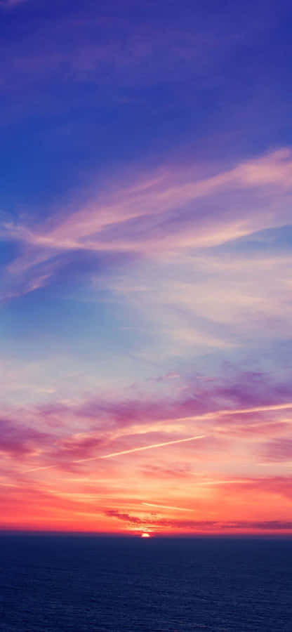 A Breathtaking View Of A Tropical Beach And The Sapphire-blue Expanse Of The Sea Wallpaper