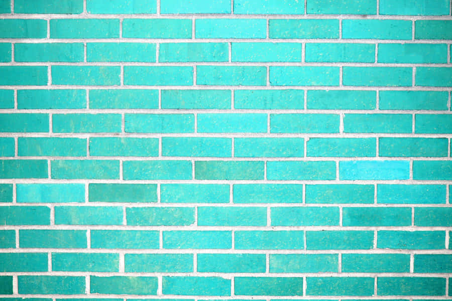 A Brick Wall With A Turquoise Color Wallpaper