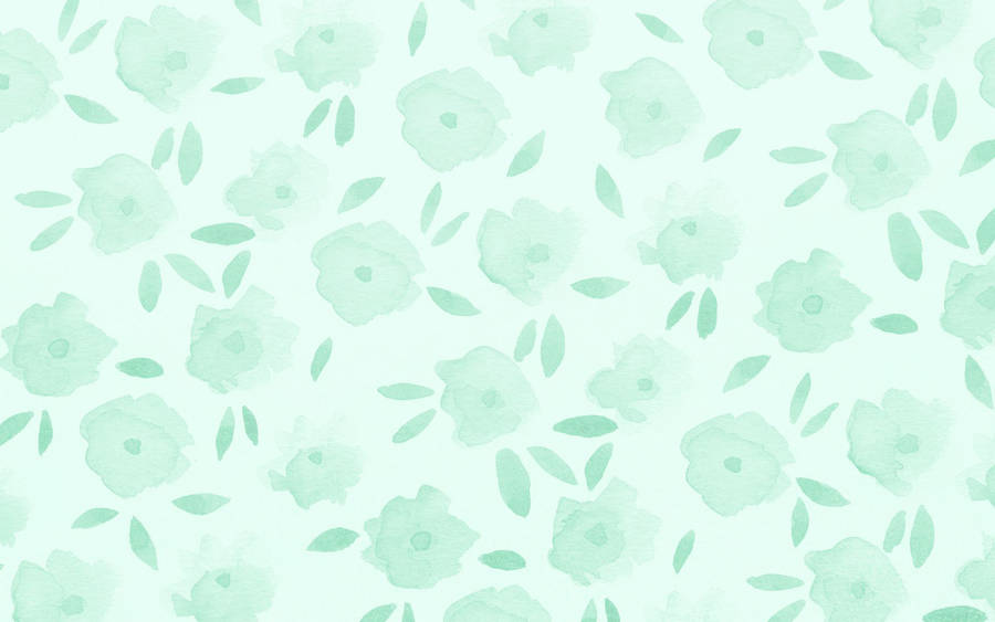 A Chic, Pastel Green Laptop Perfect For Those Looking To Add Some Aesthetic Flair To Their Work Or Study Space. Wallpaper