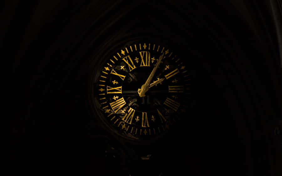 A Clock In A Dark Building Wallpaper