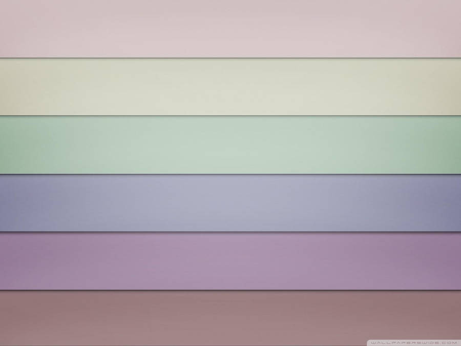 A Colorful Background With A Rainbow Of Colors Wallpaper