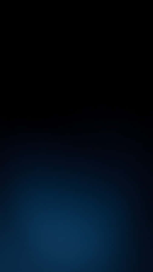 A Dark Blue Background With A Light Shining On It Wallpaper