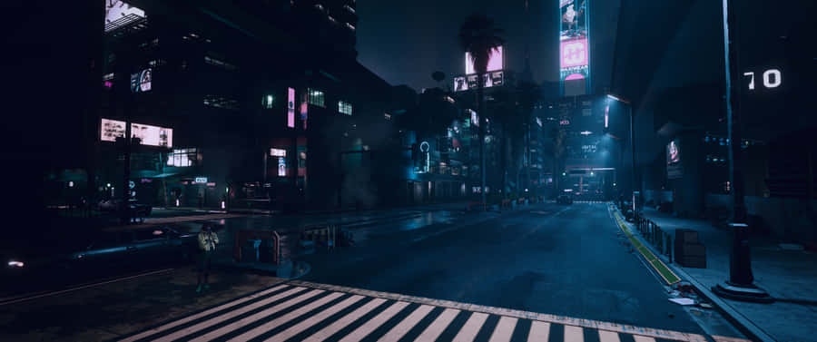 A Dark City Street With Neon Lights And A Crosswalk Wallpaper