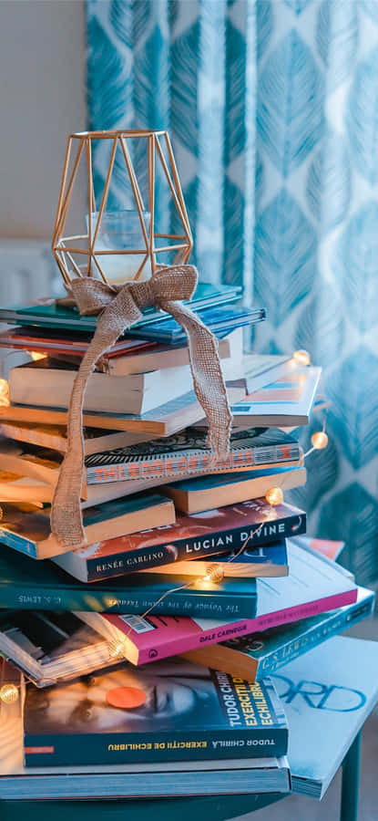 A Dreamy And Refreshing Set-up Of Books And Iphone Wallpaper