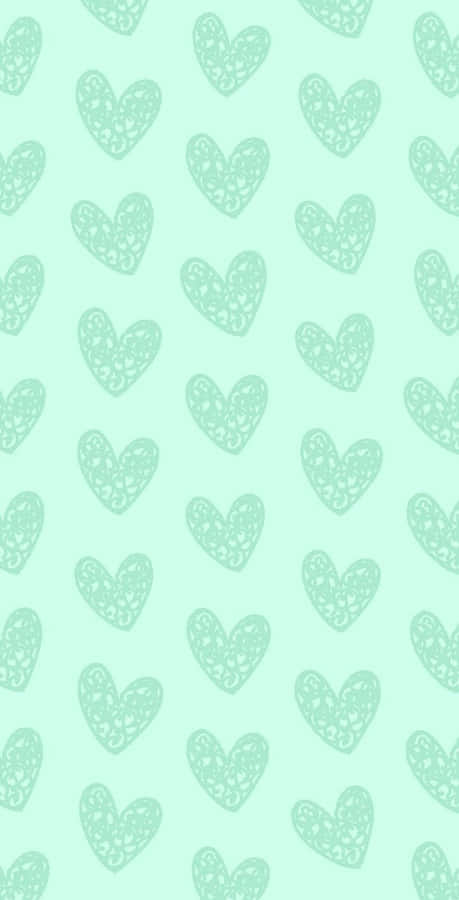 A Green Background With Hearts On It Wallpaper
