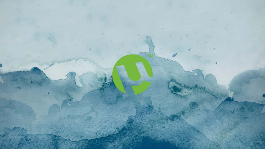 A Green Logo On A Blue Background Wallpaper