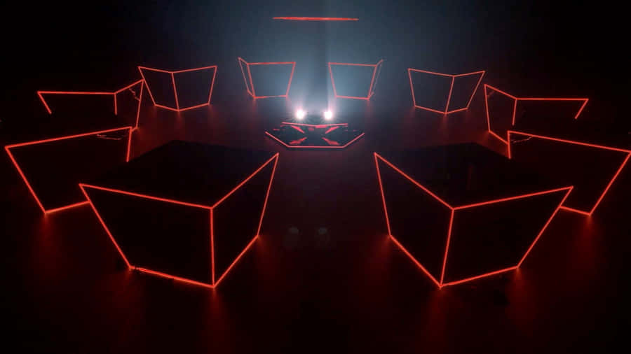 A Group Of Red Cubes In A Dark Room Wallpaper