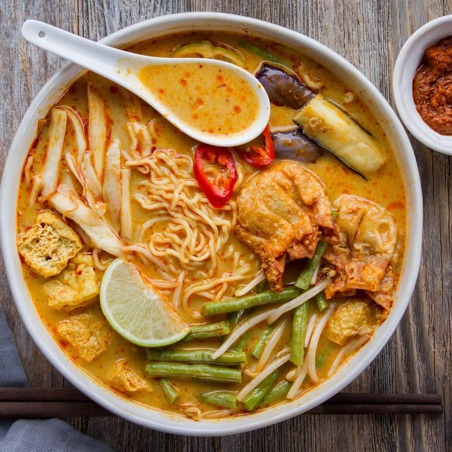 A Hearty Bowl Of Curry Laksa Ramen Wallpaper
