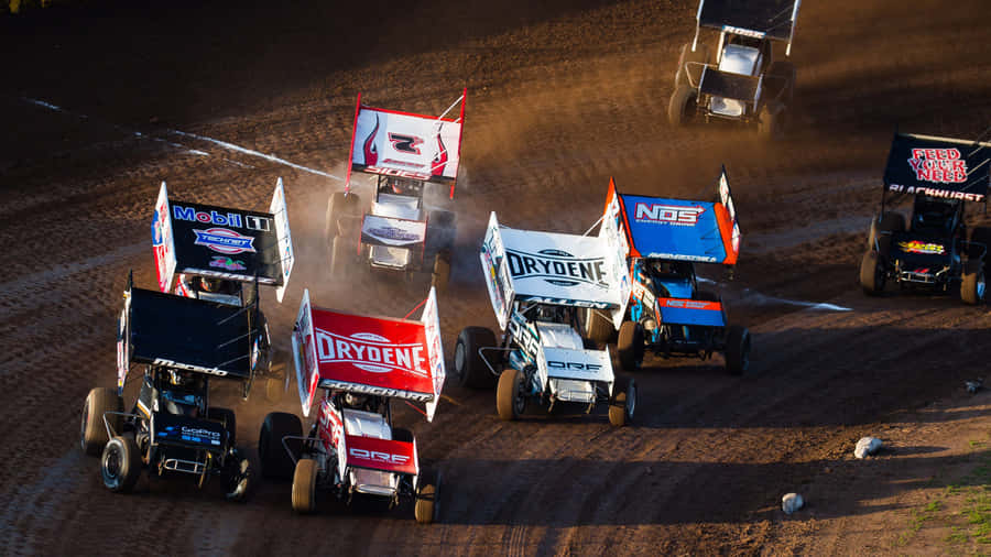 A High-powered Sprint Car Racing Around The Bend. Wallpaper