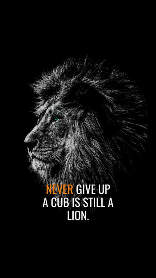 A Majestic Black And White Lion Stands Tall In The African Savanna. Wallpaper