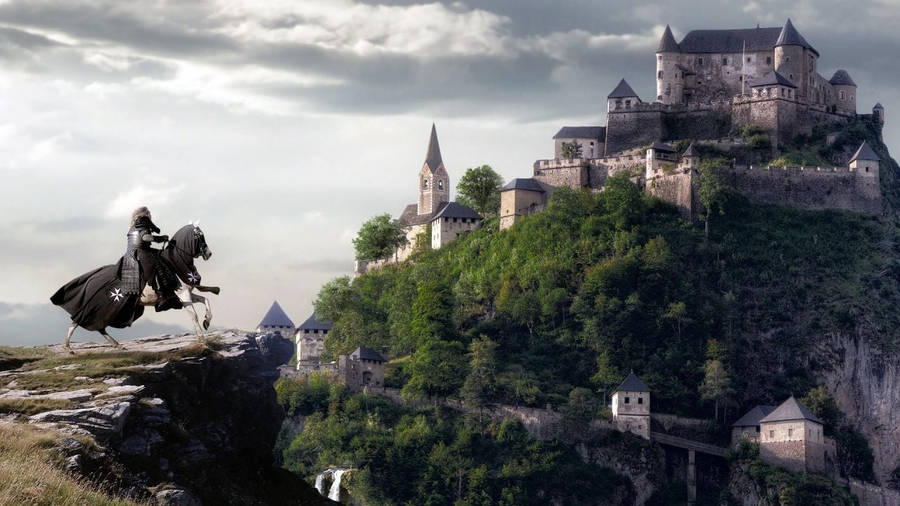 A Man Riding A Horse On A Cliff Near A Castle Wallpaper