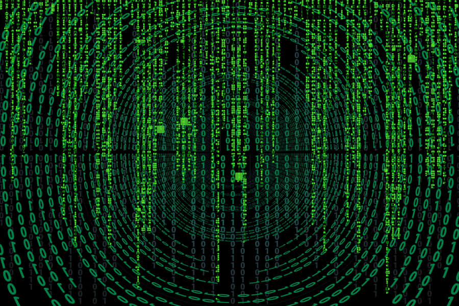 A Matrix Of Green Numbers On A Black Background Wallpaper