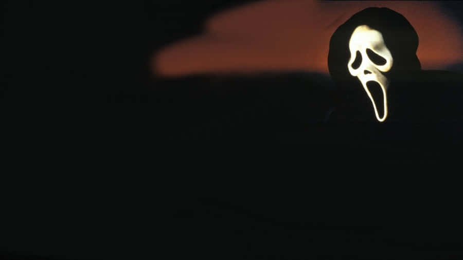 A Menacing Figure Looms In The Shadows. Wallpaper