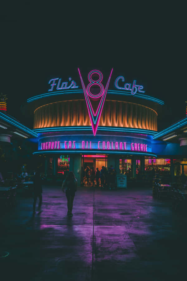 A Neon Sign For The Fl8 Cafe At Night Wallpaper