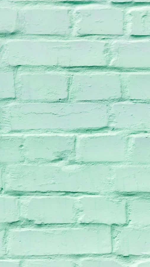 A Pastel Mint Green Background That's Perfect For Any Design Project. Wallpaper