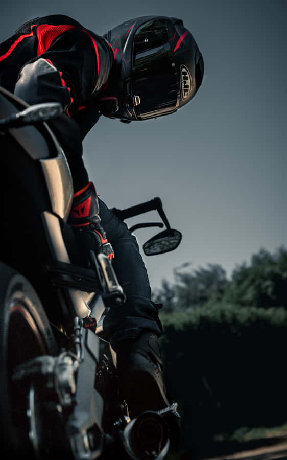 A Person Riding A Motorcycle Wallpaper