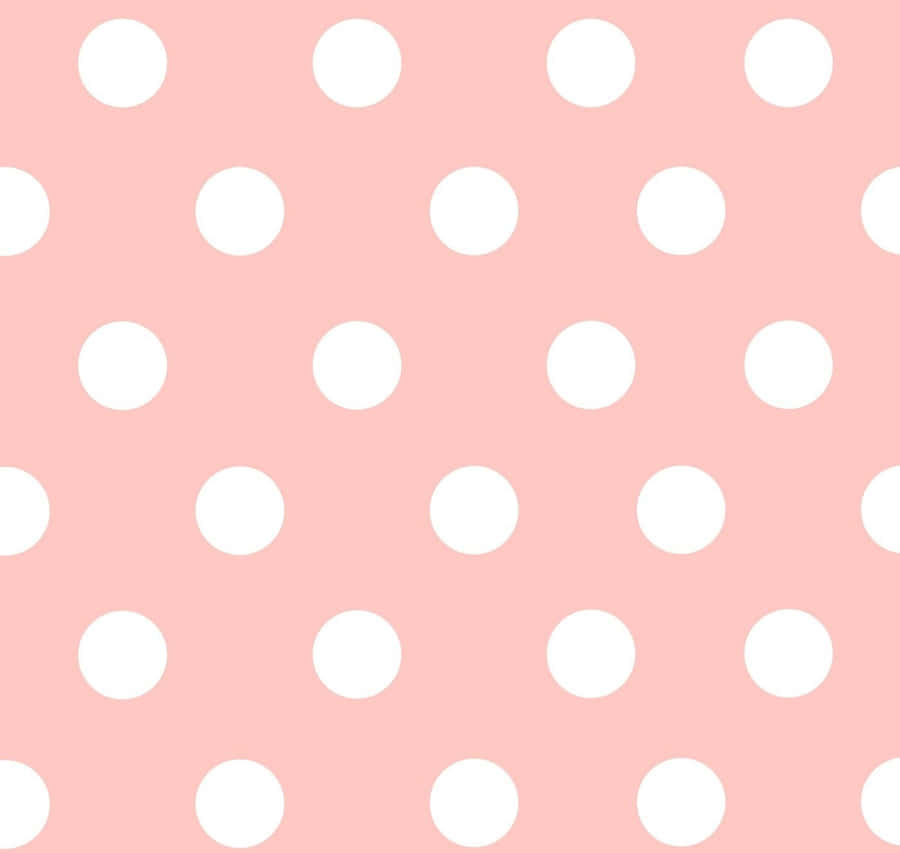 A Pink Polka Dot Pattern With White Dots Wallpaper