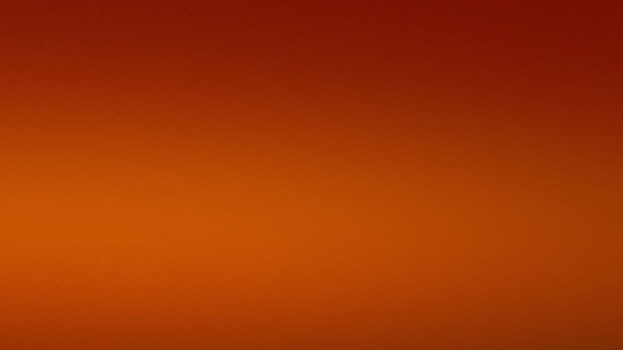 A Plane Flying Over An Orange Sky Wallpaper