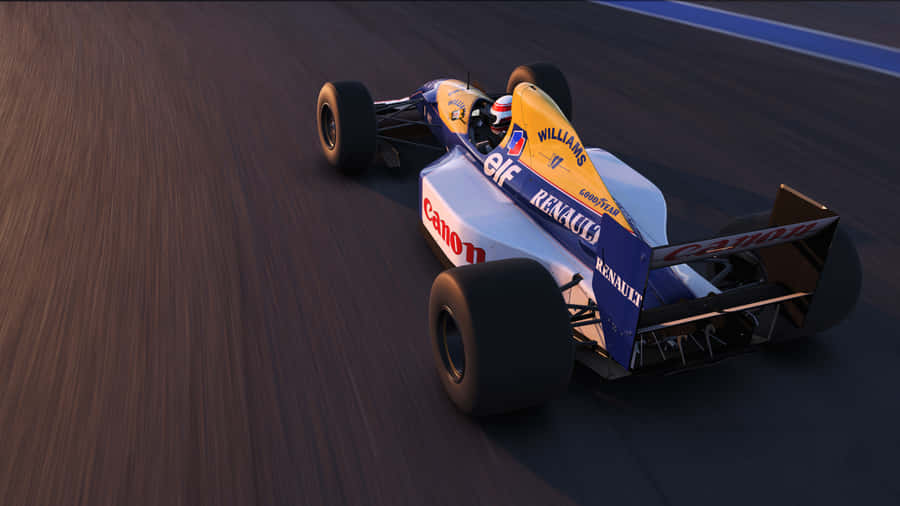 A Racing Car Driving Down A Track Wallpaper