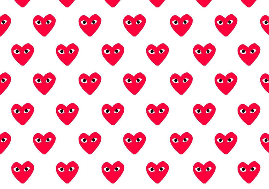 A Red Heart Pattern With Many Eyes Wallpaper