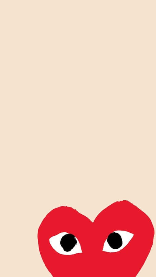 A Red Heart With Black Eyes On A Beige Background Wallpaper
