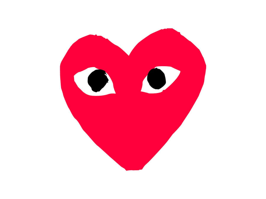 A Red Heart With Two Eyes On It Wallpaper