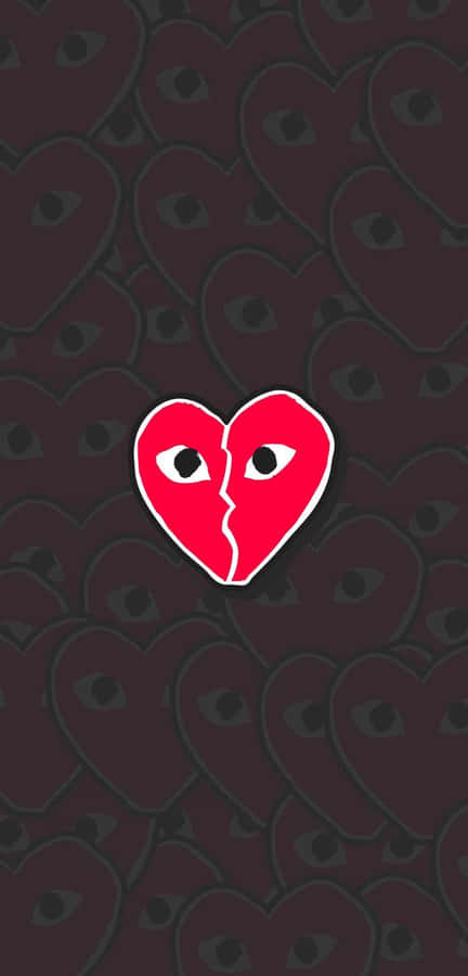 A Red Heart With Two Eyes On It Wallpaper