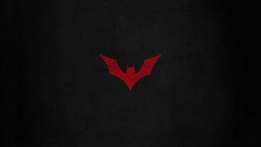 A Red Logo On A Black Background Wallpaper