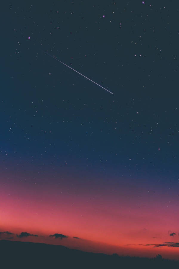 A Shot Of The Sky With A Star In The Sky Wallpaper