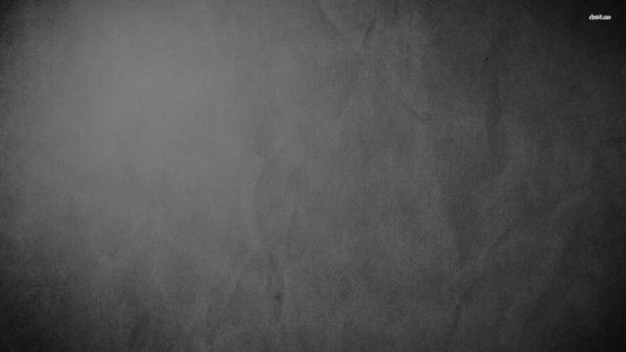 A Slightly Crumpled Gray And White Surface Wallpaper