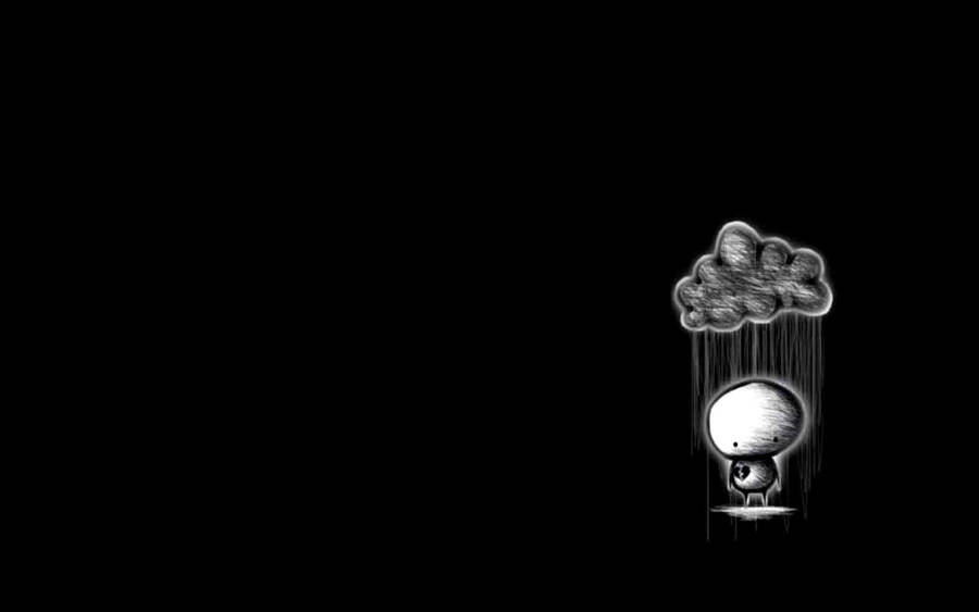 A Solitary Figure Walking In The Rain Wallpaper