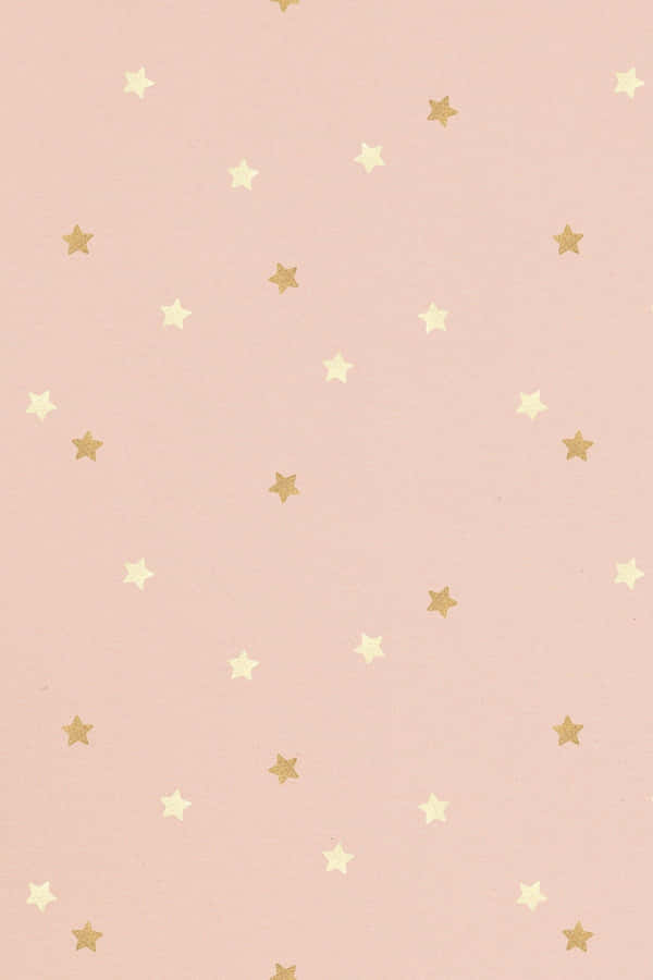 A Soothing Gradient Background Of Light Pink And Gold Wallpaper