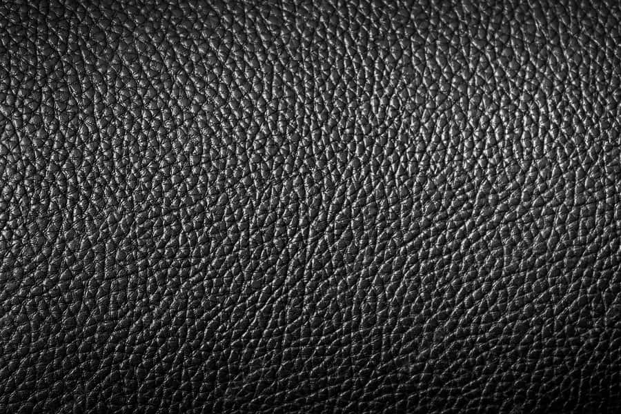 A Sophisticated Look With Black Leather Wallpaper