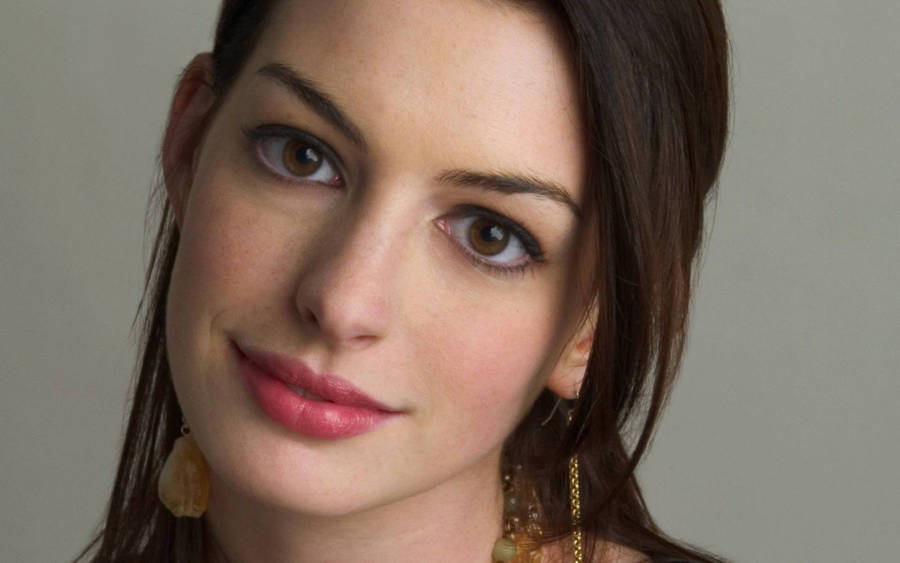 A Striking Portrait Of Anne Hathaway Wallpaper